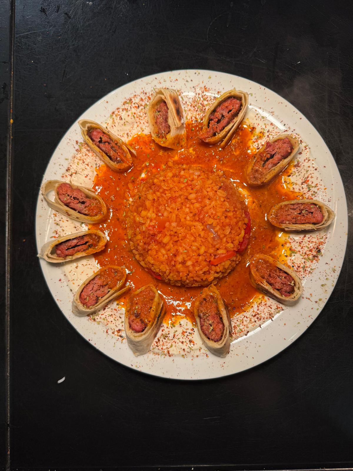 Beyti — meat rolls on rice