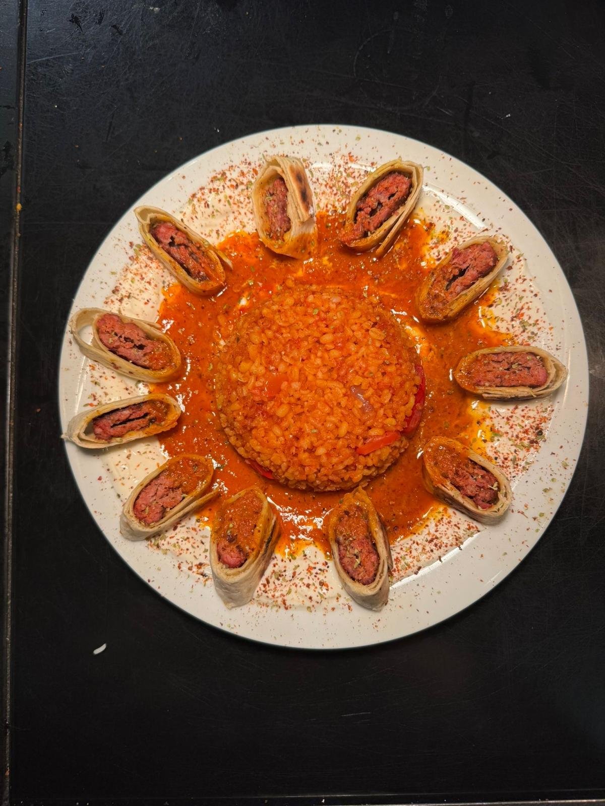 Beyti Serma — kebab rolls around saffron bulgur