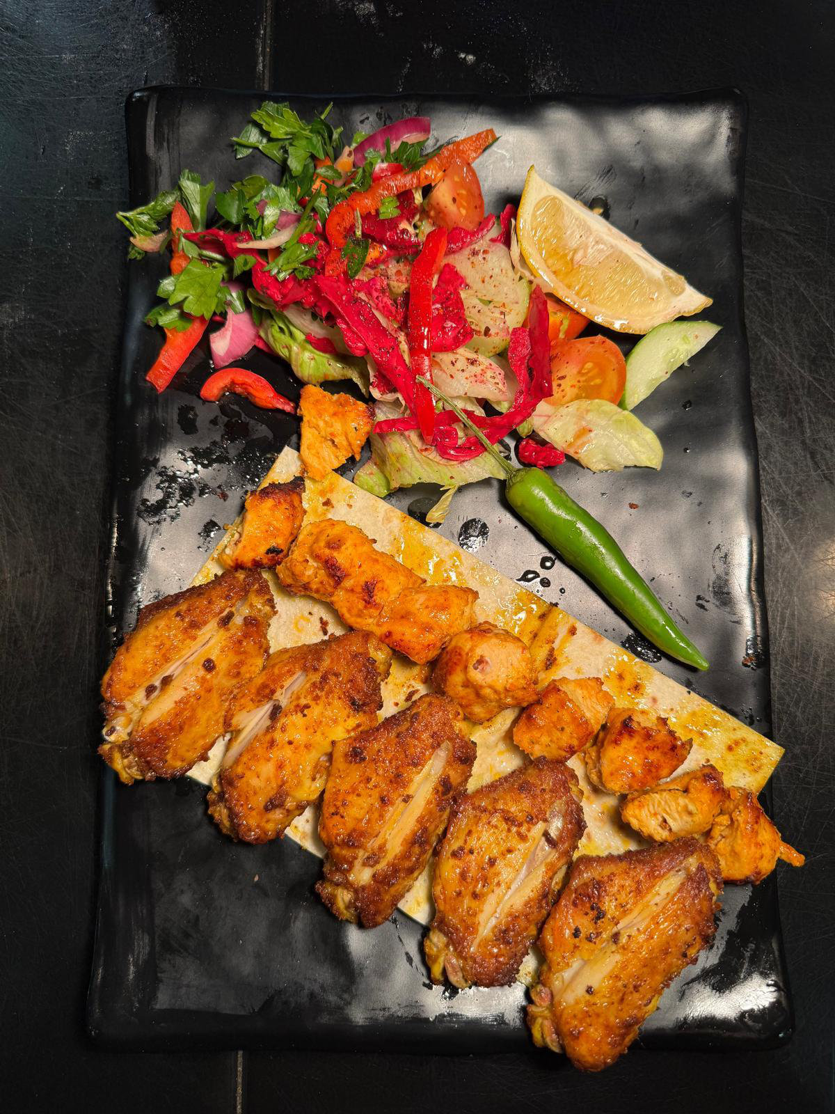 Chicken wings and kebab skewers