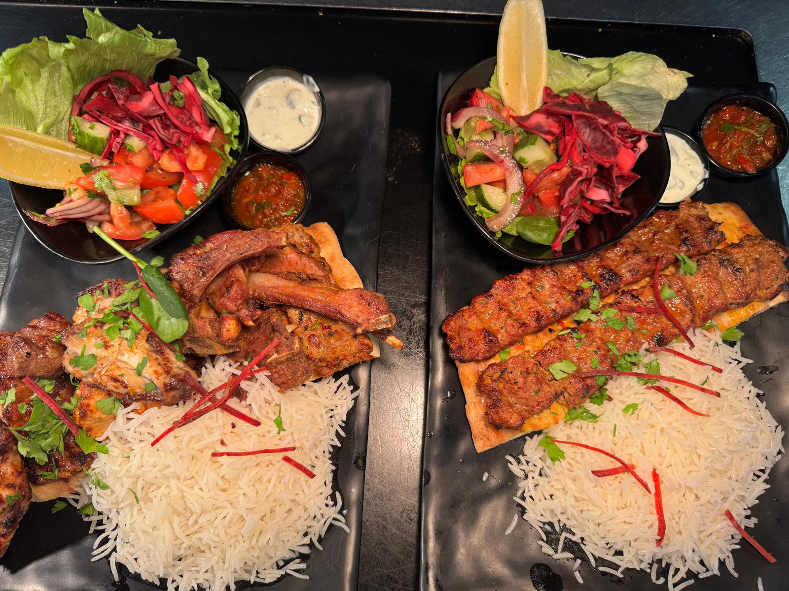 Mixed grill and kebab platters side by side